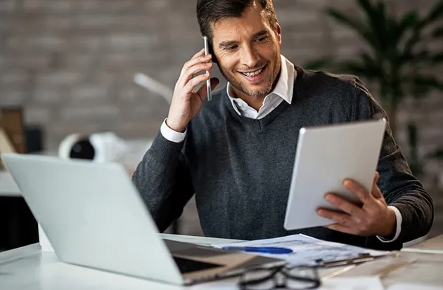 A Nova Scotia bookkeeper & tax filer reviewing financial records